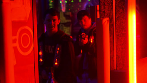 Teens playing Laser Tag